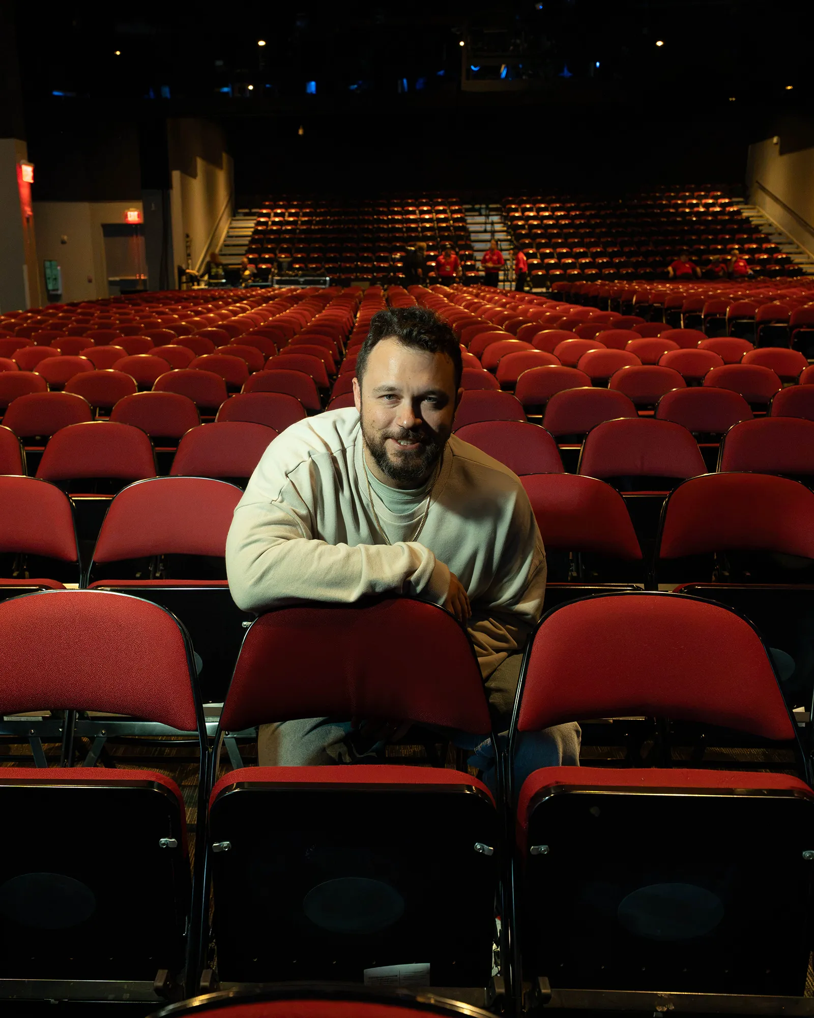 Ben Bankas seated among theater chairs in Charles Town, West Virginia