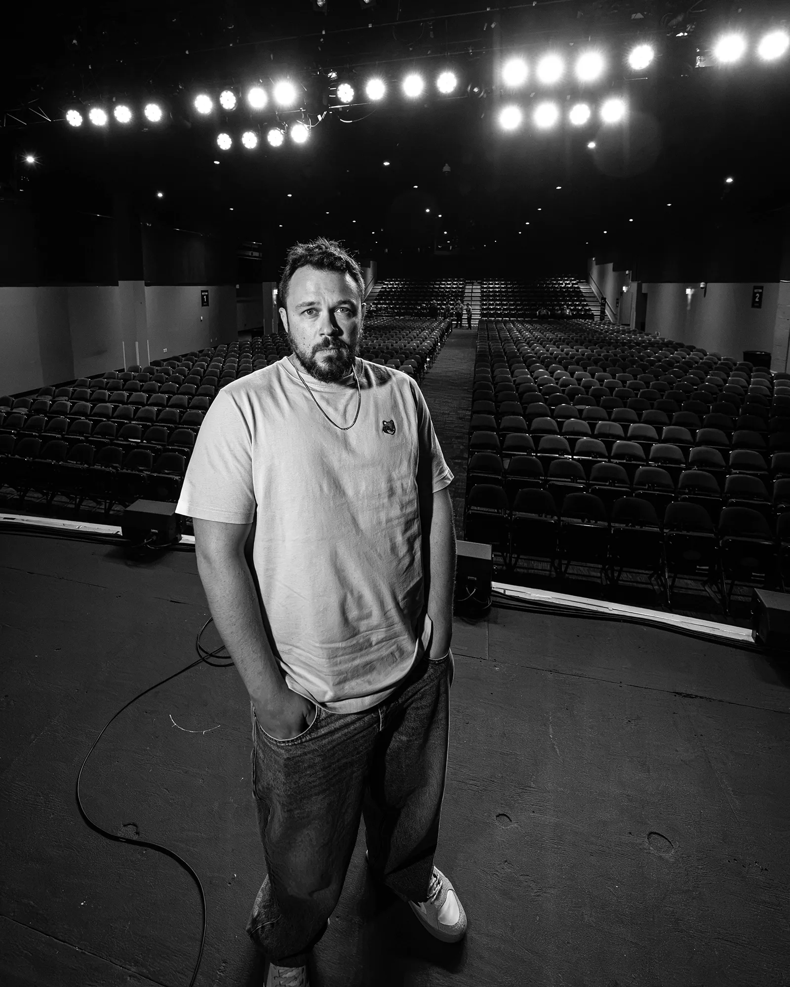 Ben Bankas on stage during a comedy show in Charles Town, West Virginia